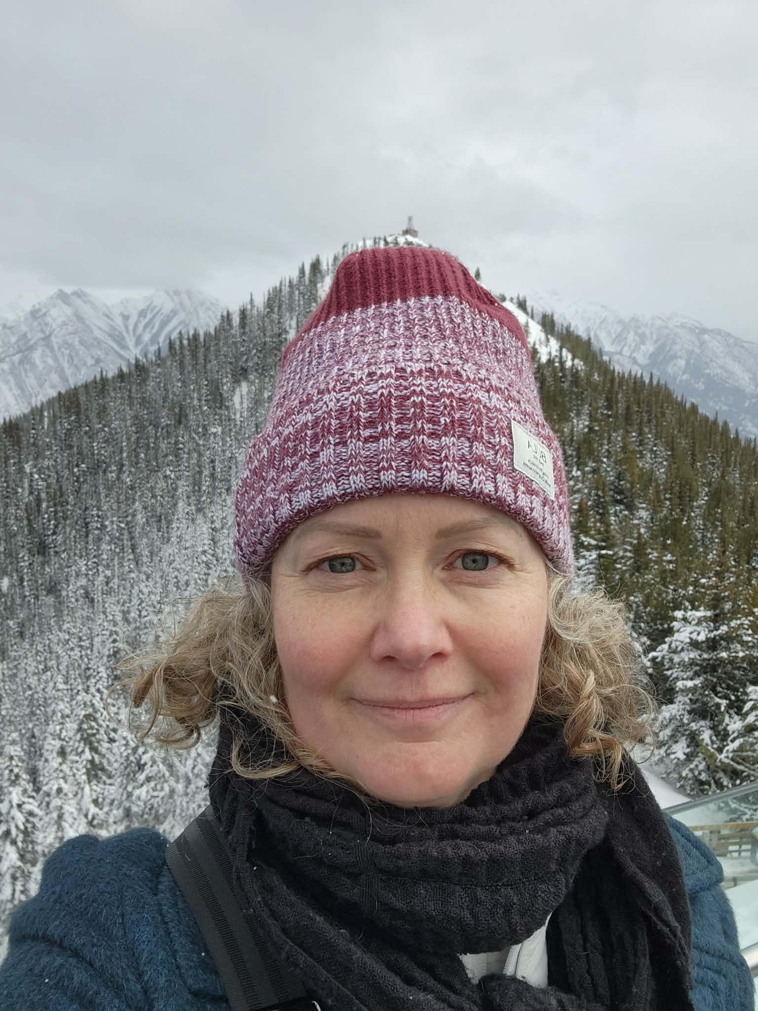 Allison breathing in fresh mountain air in Banff